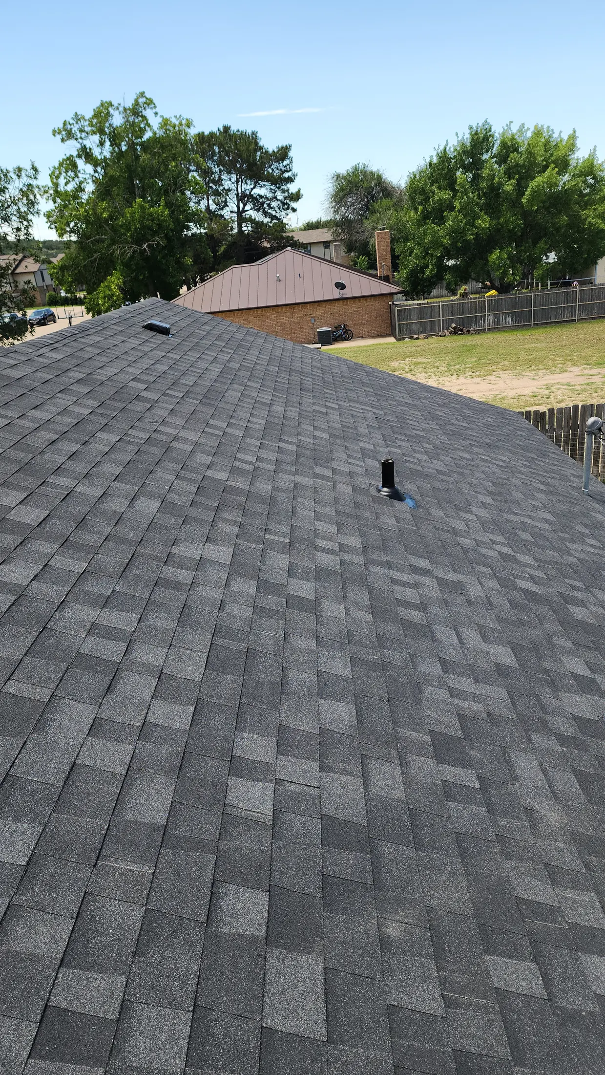 Completed architectural shingle roofing system